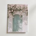 Blossom & Mint Poster i ram på vägg, blommande gren över turkos dörr, konsttryck från Bozetto